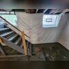 The CleanSpace covers the stains and tucks into the WaterGuard drains under the floor.
