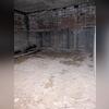 In this photo, you can see the dark spots where water was actively leaking down the wall and into the ground