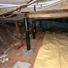 The signs of a damp crawl space include unpleasant odors, the presence of mold, rotting floor joists, and even sagging floors. A humid environment can also attract insects and pests.