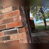 Often the first place to crack when settlement occurs is the mortar between the brick, as it is the weakest part of your wall.