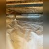 The entire crawl space has been professionally encapsulated with a CleanSpace liner, creating a sealed environment that protects the home from moisture and potential damage.