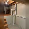 The radon mitigation system's piping was strategically installed to ensure optimal airflow and effective radon reduction.