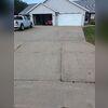 Troubled by the sight of their cracked concrete driveway, a homeowner in Combined Locks, WI, reached out to us, seeking a long-term solution.