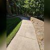 Before our intervention in Wausau, WI, the unlevel concrete outside this homeowner's property posed a safety hazard and an eyesore.