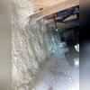 We sprayed the rim joists and wall with insulation to prevent drafts.