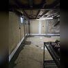 We finished new concrete over the top of the drainage system and the bottoms of the SmartJacks. This basement has now entered a new era of freshness and sturdiness.