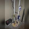 The sump pump will discharge the water out of the basement. The battery back-up generator will ensure the pump keeps working, even during a power outage.