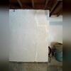 Numerous foundation wall cracks were distinctly visible in the garage corner. These vertical fissures indicate settlement, with the garage corner detaching from the main structure. Implementing a robust solution is crucial to avert further foundation deterioration.