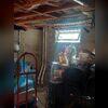 The previous sump pump was insufficient to handle the substantial influx of water seeping into the basement from the surrounding saturated soil. This inadequacy resulted in mold proliferation and a persistently humid basement environment, jeopardizing stored items and increasing the risk of damage.