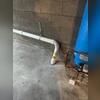 An extraction point was established through the basement floor foundation to access the underlying soil. A PVC pipe was installed at this extraction point to facilitate the safe removal of radon from beneath the home, thereby effectively preventing its infiltration into the living spaces.