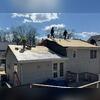 Once the plywood is secured, all the seams are sealed up with heavy-duty all-weather deck tape for added protection. Then, a full layer of underlayment is rolled out across the roof: a water-resistant membrane that shields the sheathing from moisture, wind, snow, and other harsh elements.
