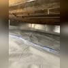 The crawlspace was in need of insulation. SilverGlo Insulation Panels were installed along the walls to reflect heat back into the crawlspace.