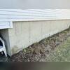 The exterior foundation wall crack indicated potential structural integrity issues. Coupled with foundation floor cracks, the homeowner's concerns about the stability of their garage were well-founded.