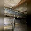 We use a steel supplemental beam with jacks to distribute the weight evenly and provide additional support. This ensures the jacks are stable and the load is properly managed, preventing structural stress or damage.