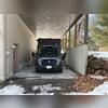 As depicted in the photo, the retaining wall was bowing inward, posing a significant risk of collapse if not promptly addressed. Stabilizing the retaining wall was crucial to preserving the structural integrity of the home and safeguarding the vehicle parked adjacent to it from potential damage.