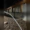 The dirt floors had turned to mud due to all of the water stuck in this crawl space.