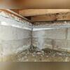 Before encapsulation, drafts from the crawl space caused uncomfortable temperatures in the room above, leading to higher energy costs and discomfort for the homeowner.