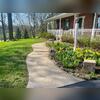 This image highlights the uneven and settled sections of a sidewalk in Morrison, IL. The significant sinking created dangerous tripping hazards, posing a serious safety concern that needed to be addressed before the area could be safely used.