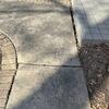 The sidewalk is unleveled and needs a strong system to restore it.