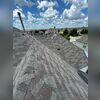 After we installed a valley liner, we reinstalled new shingles.