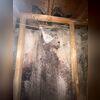 The wall is severely affected by dampness that is revealed by presence of efflorescence, as well as wood decay.