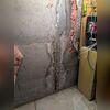 This is what the crack in Josh's basement foundation wall initially looked like when our Team arrived. You can see that it ran from the ceiling to the floor. Additionally, you can see where the previous owners attempted to repair the crack, only for it to start leaking water again.