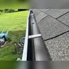 This is one section of the gutter that sustained the impact, which caused a large dent and will cause the brackets to separate from the fascia. This would only get worse with time.