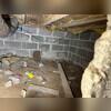 The crawlspace in the basement was filled with debris, which will first be cleared to create a clean, debris-free surface.