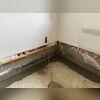 The customer was forced to remove a section of the finished wall due to moisture damage.