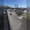 This is one of the photos our Inspector took upon the initial inspection. This roof was overly due for a replacement. Our inspector made sure to temporarily tarp the worst parts.