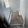 WaterGuard was installed under the concrete floor to capture any water seepage from the walls to direct it to the sump pump.