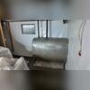 This oil tank made installation a little tricky, but our Inspector did a good job at communicating what to do for it. We bent the WaterGuard drains around the tank, and were also somehow able to get the CleanSpace behind it. Granted, it took three guys to complete the vapor barrier install behind...