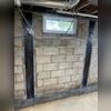 CarbonArmor straps applied to stabilize this bowing basement wall.