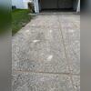 Pea-sized holes are drilled into the concrete with specialized equipment.