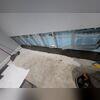 WaterGuard was installed under the floor slab to collect water seeping through where the walls meet the floors and directs that water to the sump pump.