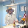 Johnny in the office sharing his love for Spicy stuff! 