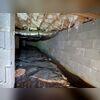 This crawl space has been affected by water intrusion and scattered debris, creating the perfect environment for mold growth and potential foundation issues. Without proper remediation, these conditions can worsen over time and compromise the health and safety of the home above.