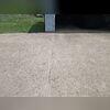 It may be hard to tell from the shadow, but the garage slab is now flush with the driveway.