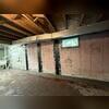 CarbonArmor Strips were applied to the walls to strengthen the foundation. Each strip is 10 times stronger in tension than steel.