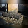 The water lines on the wooden post show where water levels often rise, staining the wood. And the wooden piece beneath the post is still very wet.