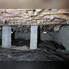 In this photo, you can see that the crawl space supports are sinking and starting to lean. The SmartJack system, once installed, will stabilize this crawl space to prevent further sinking and lift the structure back up.