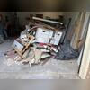 Garage cleanout- construction debris, sheetrock, scrap wood, cardboard boxes, trash, Styrofoam, household trash, washing machine, ceiling fan, vacuum, box fan, AC unit, and junk removal in Keller, TX