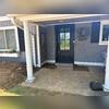 We compacted the soil around the patio so that the homeowner could patch the patios concrete.