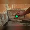 When the inspector was performing the free in-home estimate, he measured how much water was sitting against the wall. This tool measured 100% water saturation, which is the maximum level of moisture detection. This was causing the wall paint to peel, mold growth and water leakage into the basement.