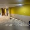 We installed EverLast Wall Panels by first removing any damaged lower wall sections, then securely mounting the durable, mold-resistant panels along the perimeter. The panels were custom-fit for a seamless finish, providing long-lasting protection and a clean, bright look for the basement.