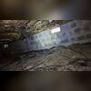 Water damage is visible in this crawl space; you can see water seeping through the concrete block foundation walls. The floor is also all muddy from the water seeping down through the walls and coming up through the dirt on the floor.