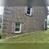 Homes on a hillside can oftentimes struggle with stability. This photo was also taken by our inspector upon initial visit.