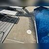 This section of the pool patio had visibly sunk below its original level. While no cracks were present, the uneven surface was both unsightly and unsafe.