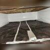 Drainage Matting was placed across the floor in the crawl space to move around any water that was stagnant towards the perimeter drains.