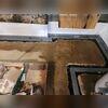 Our crew installed WaterGuard by first creating a perimeter trench around the basement, then we carefully lowered the drainage channel directly above the foundation footing to avoid potential clogs. The system was then surrounded with clean-washed stone and a layer of cement is applied to restore...